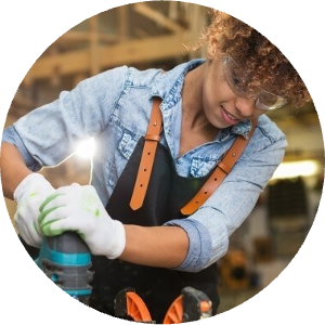 woman using a power tool for construction