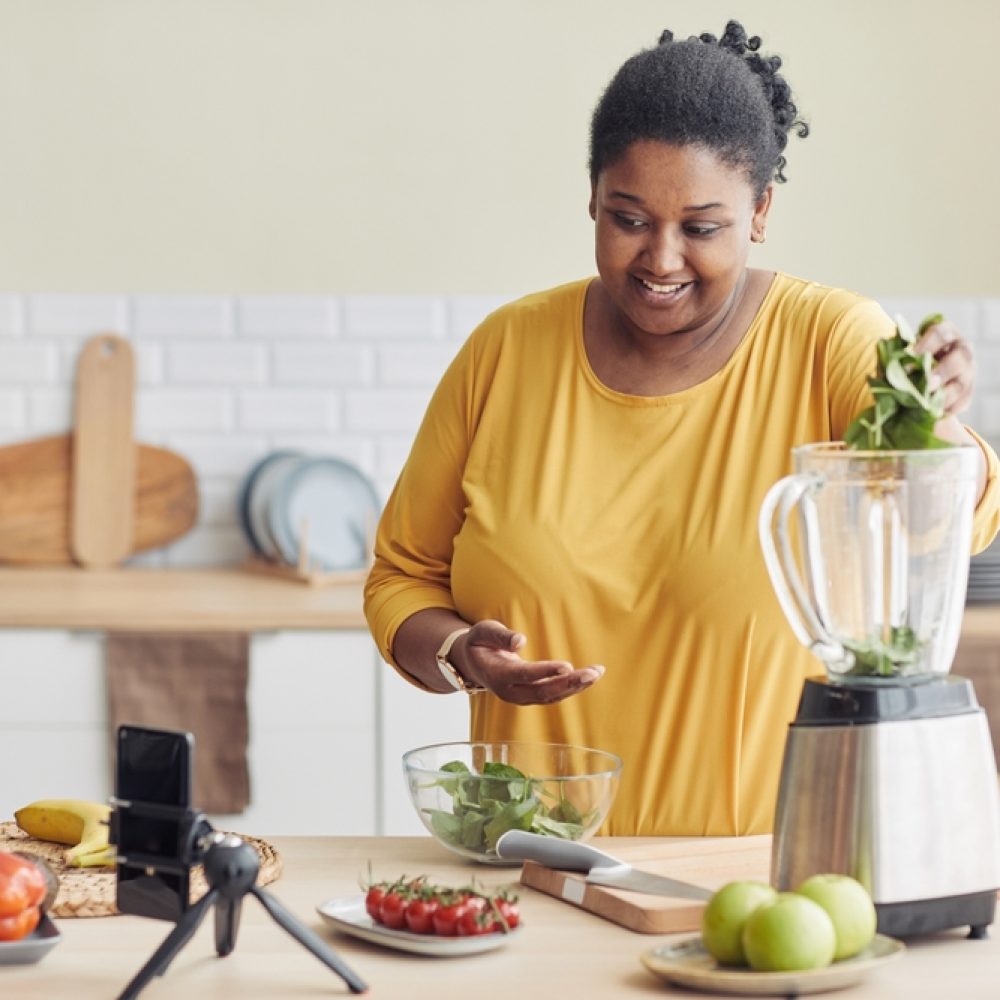 Woman making a smoothie